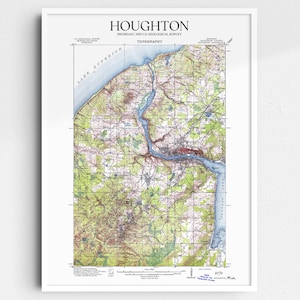 May include: A vintage topographic map of Houghton, Michigan, featuring a detailed depiction of the area's terrain, waterways, and roads. The map is titled "Houghton, Michigan" and includes the text "U.S. Geological Survey" and "TOPOGRAPHY".