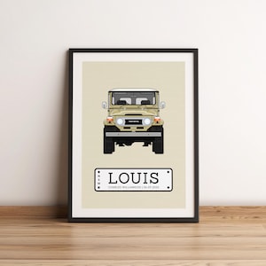 May include: A framed print of a beige vintage off-road vehicle with a black number plate that reads "LOUIS CHARLES WILLIAMSON | 18.09.2023".