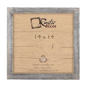 May include: A rustic gray wood picture frame with a 14x14 inch opening. The frame has a light wood finish and the text "Rustic decor" and "100% Recycled Materials Made in the USA Oklahoma City, Oklahoma 73179" is printed on the mat.
