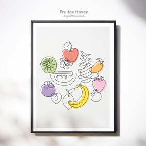 May include: A framed print featuring a minimalist line drawing of various fruits, including an apple, kiwi, pineapple, mango, strawberry, banana, and more. The fruits are outlined in black with colorful accents. The text "Fruitee Haven - Digital Download" is at the top.