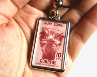 Ostrich Stare Keyring - upcycled 1957 postage stamp from Spanish Sahara