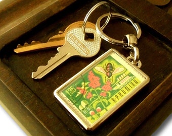 Honey Bee Keyring - Retro pink green, upcycled Romania postage stamp 1963