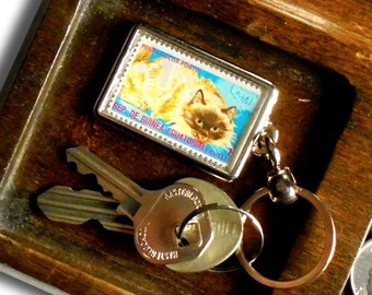 Colourpoint Persian Cat Keyring, upcycled 1975 postage stamp from Equatorial Guinea