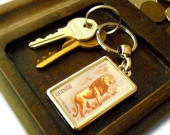 Prowling Lion Keyring - upcycled 1962 Guinea postage stamp