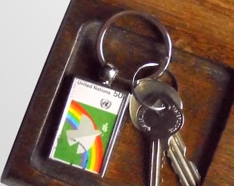 Peace Dove & Rainbow Keyring - upcycled 1976 United Nations postage stamp