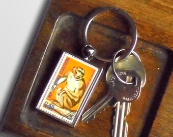 Barbary Macaque Keyring, upcycled 1975 postage stamp from Equatorial Guinea