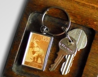 Trumpeting Elephant Keyring - upcycled 1957 postage stamp from Spanish Guinea