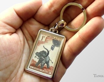 Elephant & Hot Air Balloon Keyring - vintage 1955 postage stamp tribute to Jules Verne