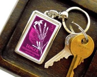 Purple Magenta Floral Keyring, upcycled 1956 charity stamp from Tangier
