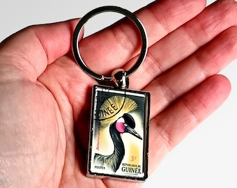 Black Crowned Crane Keyring - upcycled 1962 Guinea postage stamp