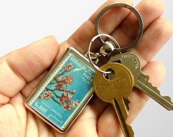 Pink Blossom Keyring - upcycled 1956 postage stamp from Somalia