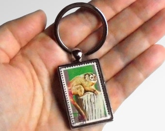 Peruvian Night Monkey Keyring, upcycled 1975 postage stamp from Equatorial Guinea