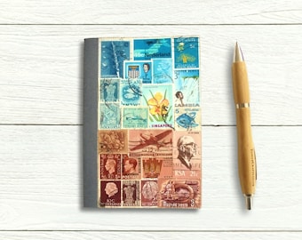 Stamp Art Journal Notebook featuring upcycled world stamps in an abstract landscape