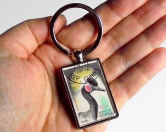 Black Crowned Crane Keyring - upcycled 1962 Guinea postage stamp