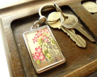 Desert Rose Keyring - upcycled 1983 used postage stamp from Kenya