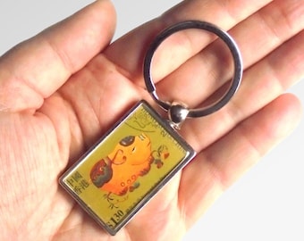Chinese Year of the Pig Keyring made with postage stamp from Hong Kong, 1999