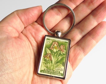 Foxglove Orchid Keyring - vintage 1961 postage stamp from Ivory Coast
