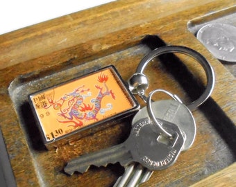 Chinese Year of the Dragon Keyring made with 1999 postage stamp from Hong Kong