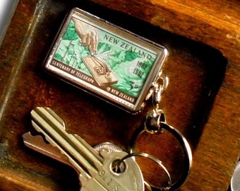 Telegraph Keyring - upcycled 1962 postage stamp from New Zealand