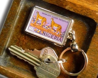 Cheetah Keyring - upcycled 1973 used postage stamp from Nigeria