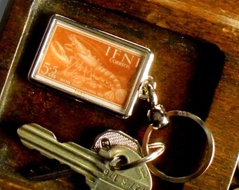 Lobster Keyring - upcycled 1954 postage stamp from Ifni