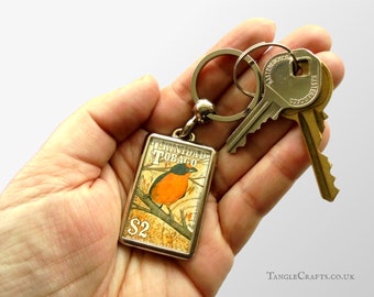 Yellow Bird Keyring featuring real postage stamp from Trinidad & Tobago