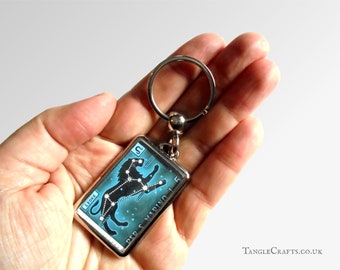 Leo Zodiac Keyring made with upcycled vintage 1970 postage stamp