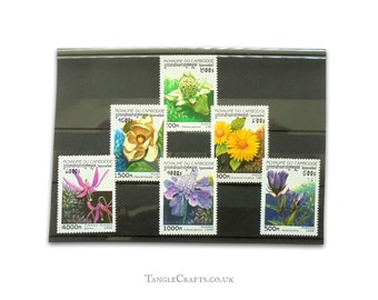 Flowers on Postage Stamps from Cambodia, 1998 | magnolia gentian butterbur scabiosa - topical floral postal stamp selection for junk journal