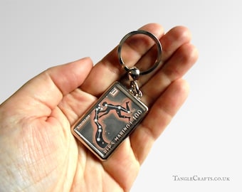 Aquarius Keyring made with upcycled vintage 1970 postage stamp