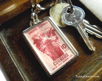 Ostrich Stare Keyring - upcycled 1957 postage stamp from Spanish Sahara