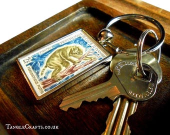 Potto Keyring - vintage 1964 postage stamp from Ivory Coast