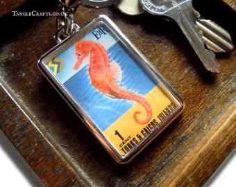 Seahorse Keyring - upcycled 1971 postage stamp from Turks & Caicos Islands