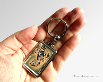 Zodiac Keyring made with upcycled vintage 1970 postage stamp