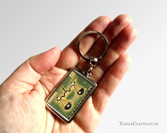 Zodiac Keyring made with upcycled vintage 1970 postage stamp