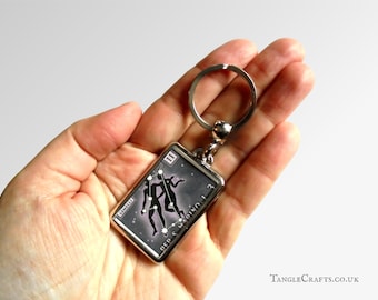 Gemini Keyring made with upcycled vintage 1970 postage stamp