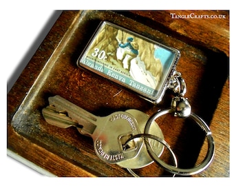 Mountain Climber Keyring made with upcycled vintage 1968 postage stamp