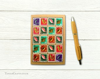 Fish Notebook, Upcycled with Retro 70s Postage Stamps from New Zealand | Sea fishing stationery, dot page journal | Quirky fisherman gift