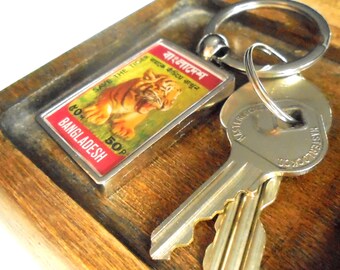 Crying Tiger Cub Keyring - upcycled 1974 used postage stamp from Bangladesh