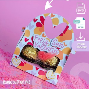 Puede incluir: Una caja de San Valentín imprimible para chocolates Ferrero Rocher. La caja está decorada con corazones y el texto "Feliz San Valentin".