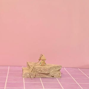 May include: A rustic wooden sign with the text "Welcome to our home" in white lettering. The sign features a distressed finish and a simple, inviting design, perfect for entryway decor.