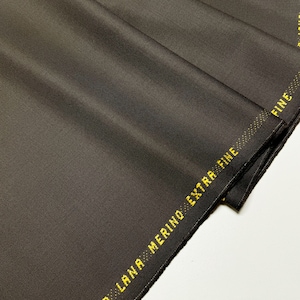 Discover high-quality merino wool in a beautiful gray and brown color. This Fabric is ideal for suits, and jackets, Italian Merino wool is a luxurious fabric, made with wool fibers, extremely soft and comfortable to wear. This fabric gives the things made from this fabric a luxurious look and superb calm.
