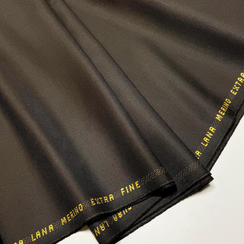 Discover high-quality merino wool in a beautiful gray and brown color. This Fabric is ideal for suits, and jackets, Italian Merino wool is a luxurious fabric, made with wool fibers, extremely soft and comfortable to wear. This fabric gives the things made from this fabric a luxurious look and superb calm.