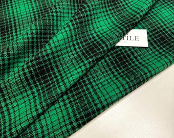 Mieszanka wełny: Włoski materiał na garnitury, zielona kratka