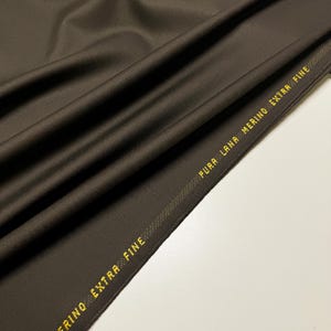 Discover high-quality merino wool in a beautiful gray and brown color. This Fabric is ideal for suits, and jackets, Italian Merino wool is a luxurious fabric, made with wool fibers, extremely soft and comfortable to wear. This fabric gives the things made from this fabric a luxurious look and superb calm.