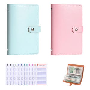 May include: Two A6-sized binders in light blue and light pink with snap closures, accompanied by a set of multi-coloured punched budget sheets and an open brown wallet containing paper currency with a portrait of Queen Elizabeth II visible.