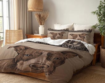 May include: A dog-themed bedding set in brown and white. The duvet cover features a large dog portrait, with matching pillowcases. The bedding is on a wooden bed frame, with a neutral colour scheme. The text on the duvet cover reads "...ONLY ABOUT...WILL BELIEVE..."