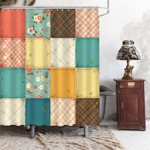 May include: A shower curtain featuring a patchwork design of sixteen square panels. The pattern includes alternating blocks of floral prints on teal and orange backgrounds, solid yellow squares, and brown or orange plaid patterns with white accents.