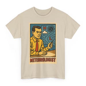 May include: A beige t-shirt with a vintage-style graphic of a meteorologist. The graphic depicts a man in a yellow shirt and red tie, pointing at a weather map with a hurricane symbol. The word "METEOROLOGIST" is printed below the image.
