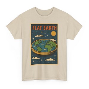 May include: Beige t-shirt featuring a retro graphic with the words "FLAT EARTH" above a stylized image of the Earth as a flat disc. The design includes a sun, stars, and clouds, with a blue and green color scheme.