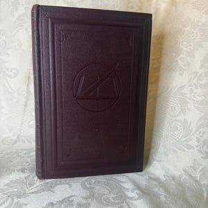 May include: A set of three ceramic mugs with a speckled, matte finish in cream, light grey, and dark grey. Each mug has a simple, minimalist design, ideal for coffee or tea.